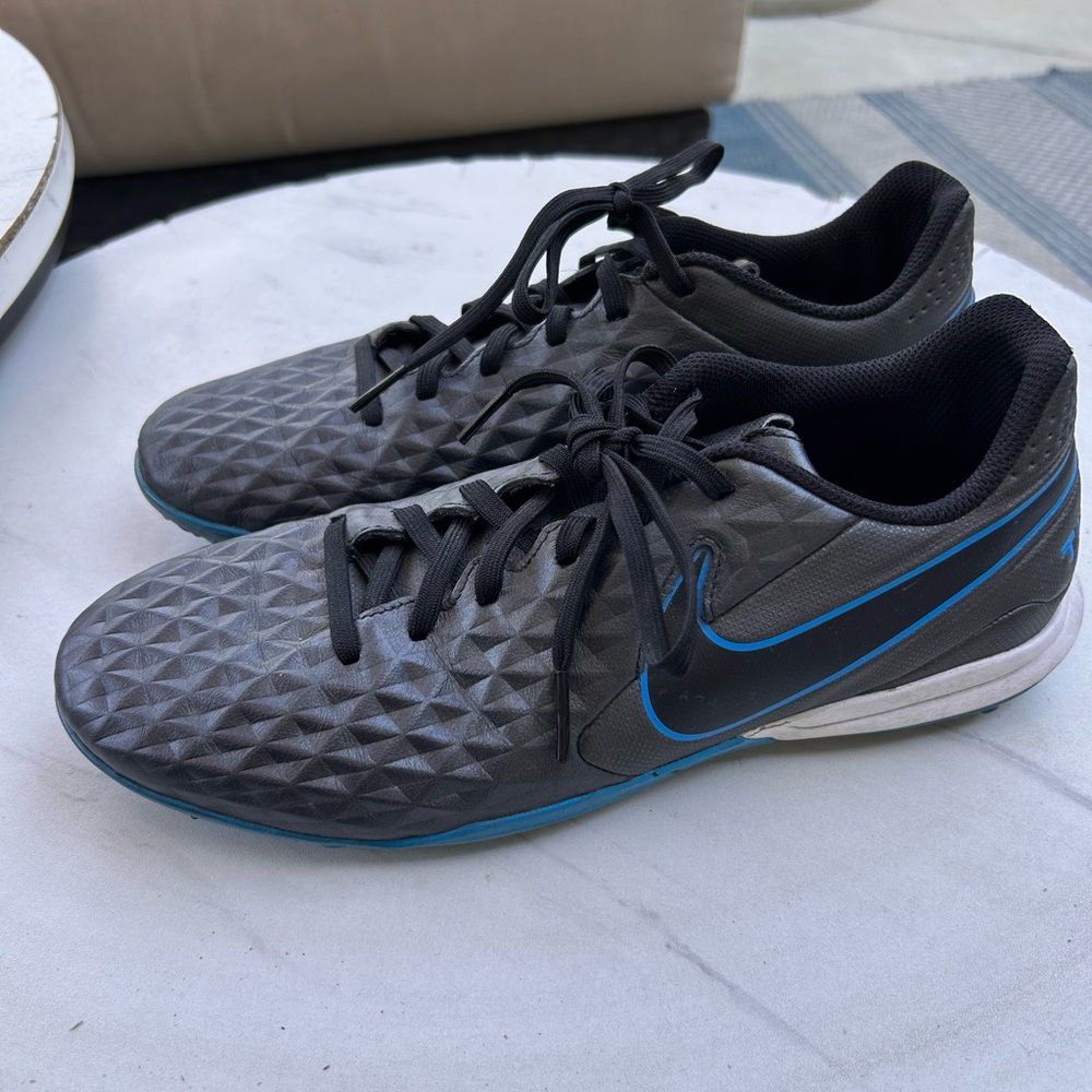 Black/blue Nike Tiempo Turf shoes